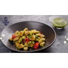 Ñoquis de coliflor en pesto de cilantro y queso parmesano